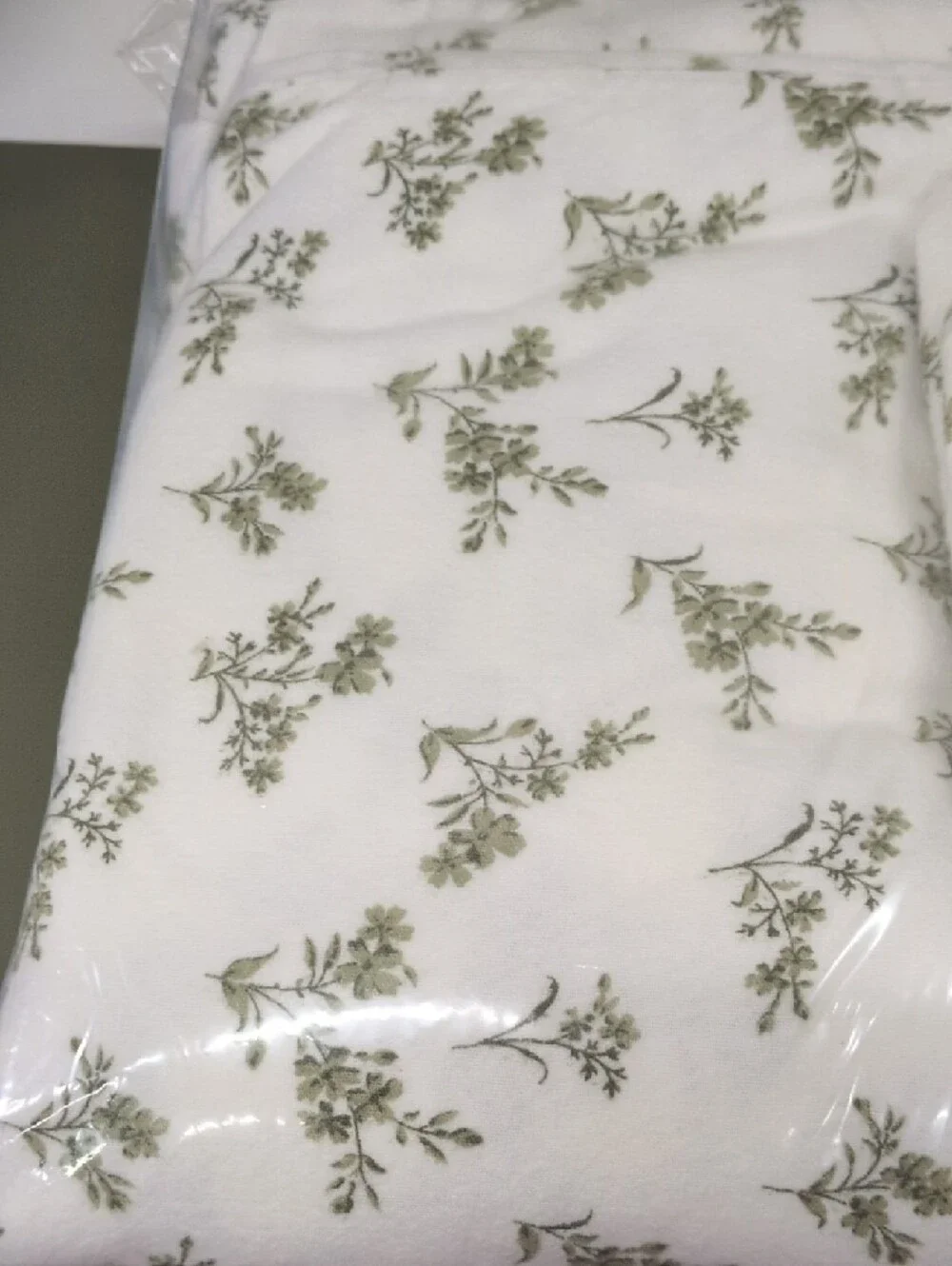 Garnet Hill Cream Duvet Cover with Green Floral Print.